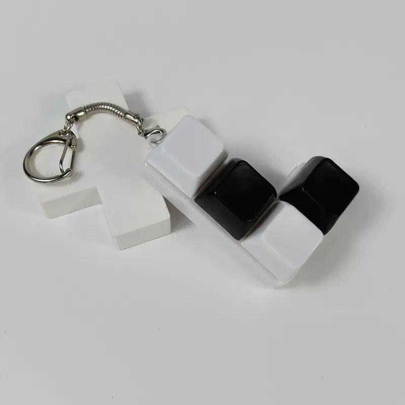 black and white caps keychain ver.3