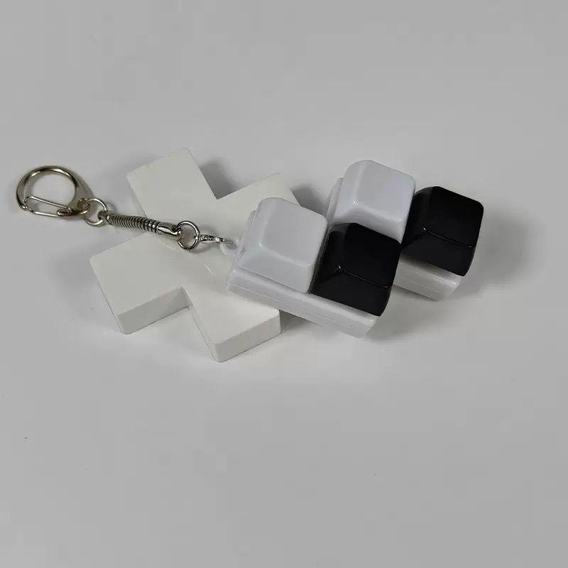 black and white caps keychain ver.1