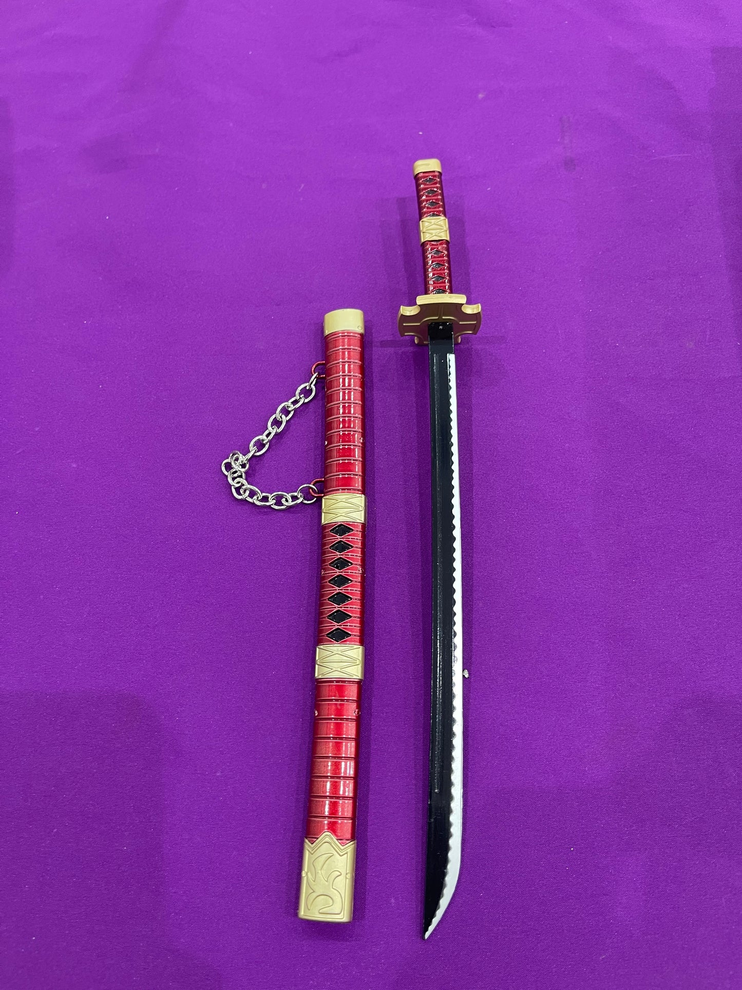 Zoro red sword keychain