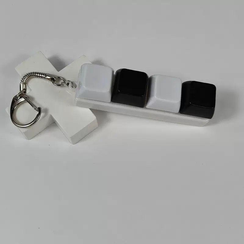 black and white caps keychain ver.4